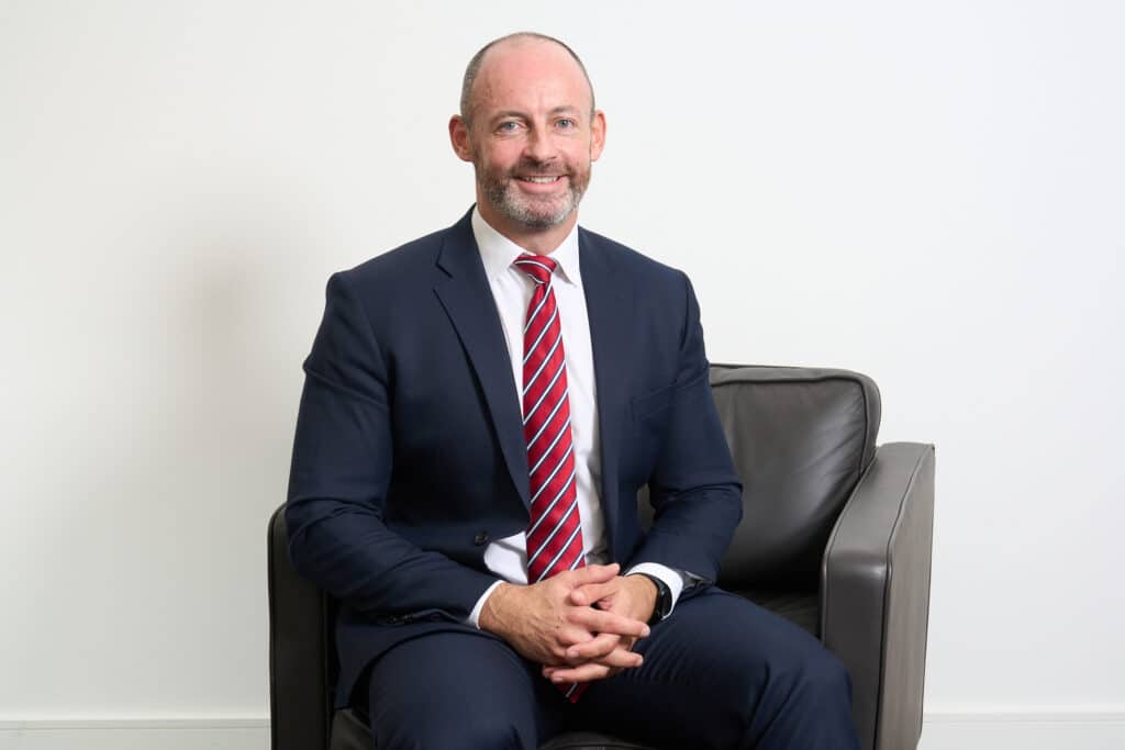 Professional portrait of Dr Graham Little, Partner at The McLean Partnership.