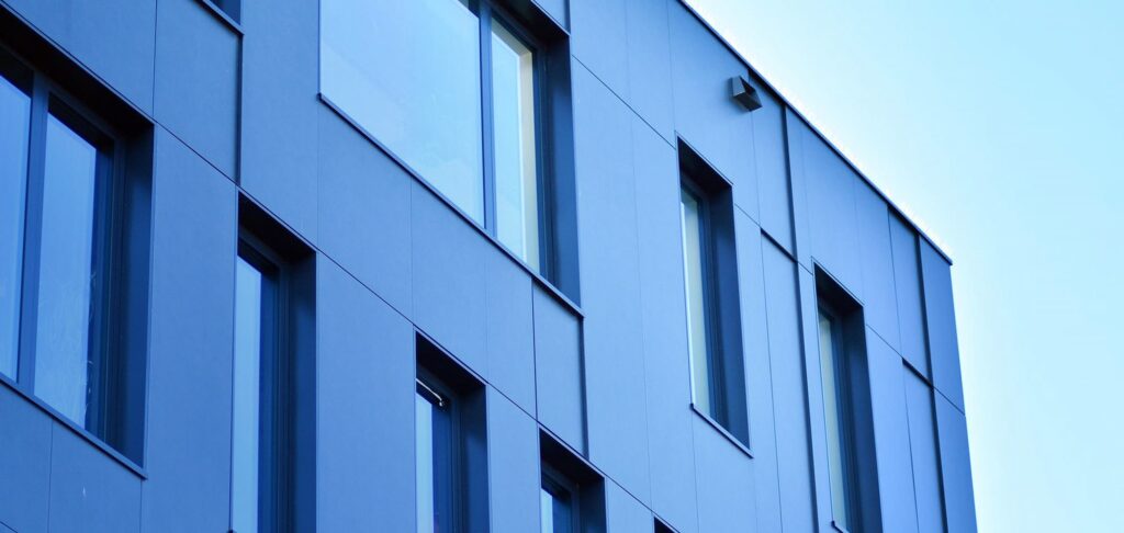 Modern office building facade symbolising resilience and agility in investment.