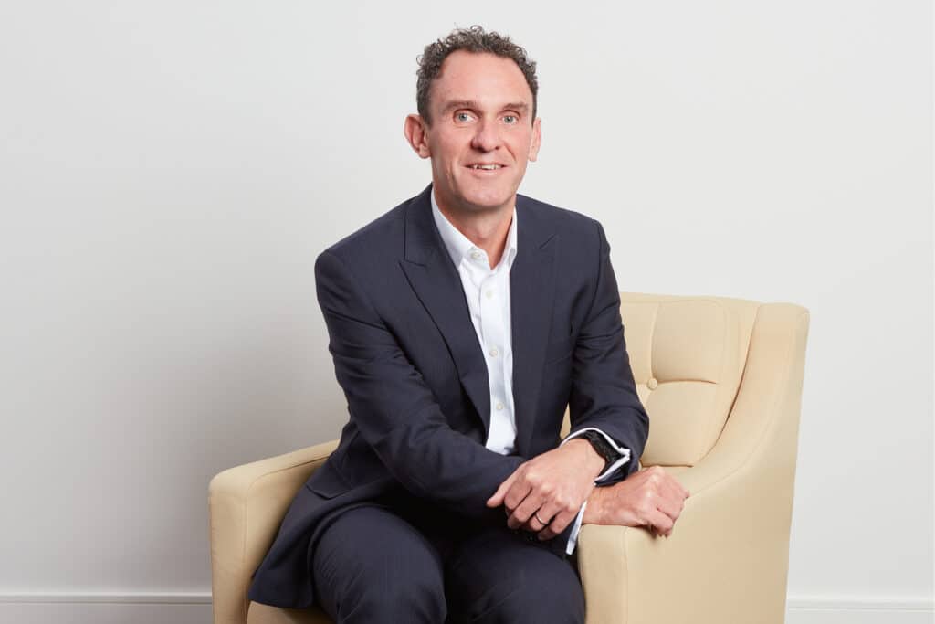 Professional portrait of Gary Belchem, Finance Director at The McLean Partnership.