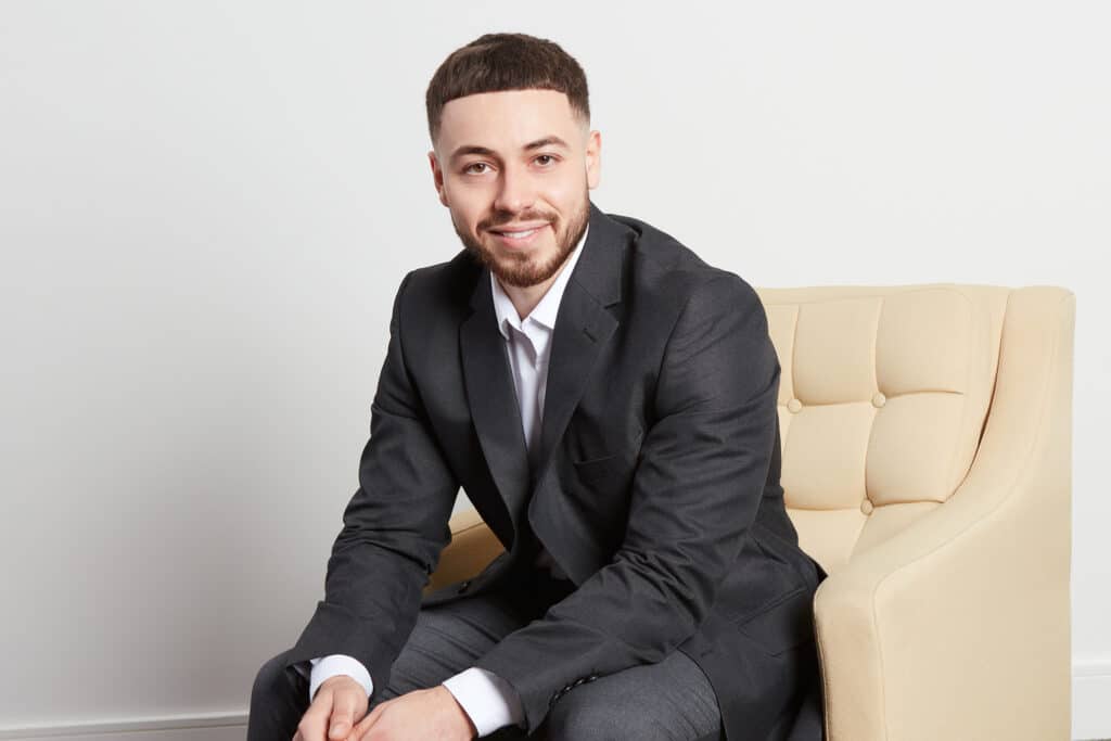 Professional portrait of Giuseppe Feniello, Associate Partner at The McLean Partnership.