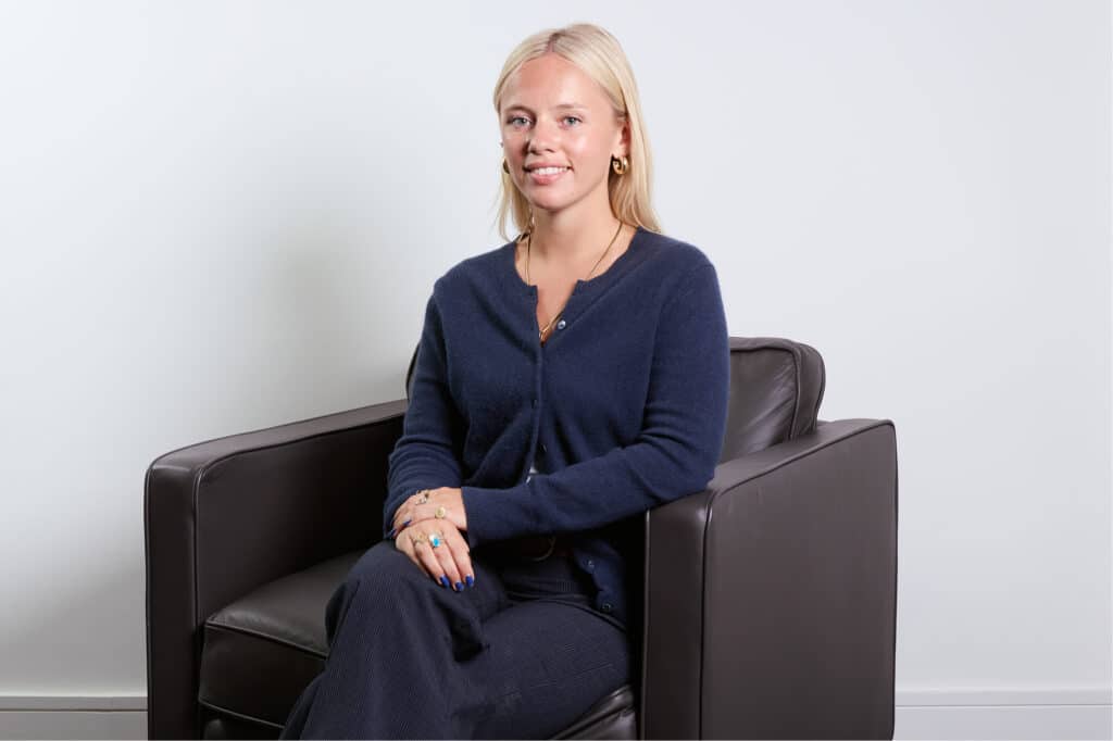 Professional portrait of Madi Bloxham, Researcher at The McLean Partnership.
