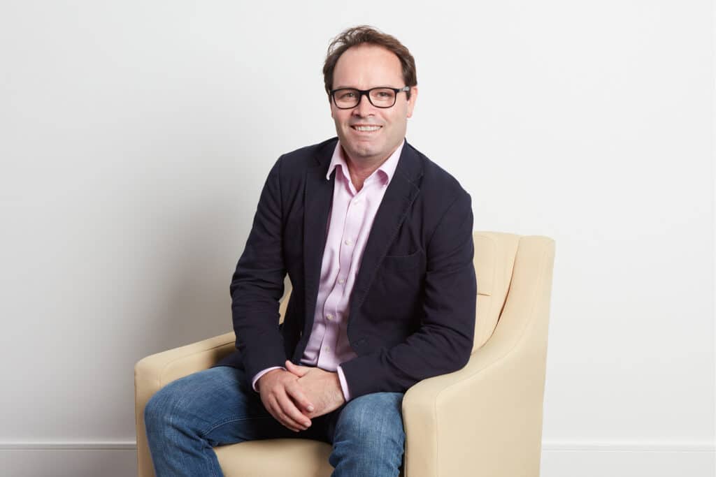 Professional portrait of Paul Young, Partner at The McLean Partnership.