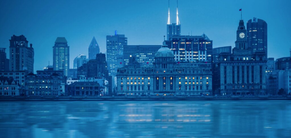 City skyline across the River Thames, symbolising financial strength of a listed UK investment bank.